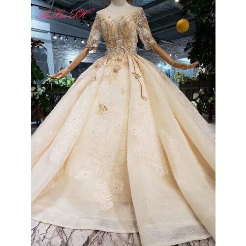 AnXin SH Luxury princess champagne flower lace beading crystal illusion o neck sparkly half sleeve wedding dress 100% real photo