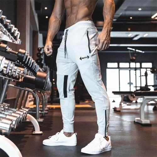 2019 Men Autumn Cotton Long pants Male Gyms Fitness Casual Fashion sweatpants Joggers Bodybuilding Pants Skinny Brand Trousers