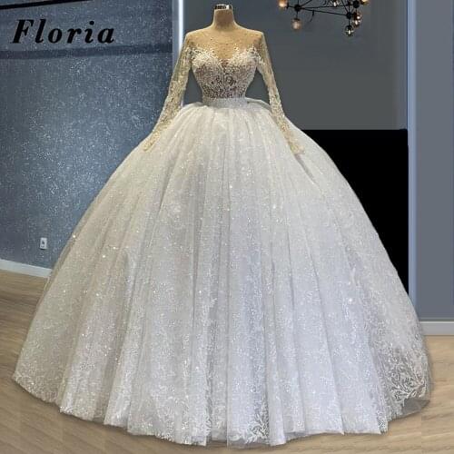 Luxury Ball Gown Pearls Lace Wedding Dresses Long Sleeve Bridal Gowns Robes De Mariée 2021 Women Arabic Dubai Beaded Bride Dress