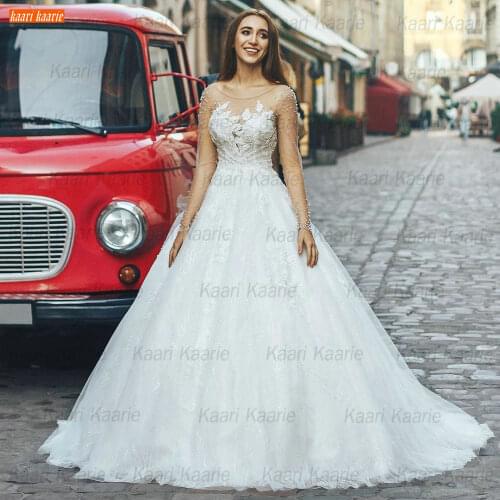 Exqusite Long Sleeves Wedding Gowns White 2021 Robe De Mariée Lace Appliques Beading Bride Dresses Sexy Backless Hochzeitskleid