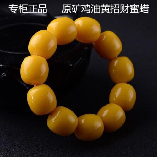 Chicken oil huang Lao beeswax men and women bracelet natural amber hand strings attached certificate with honey