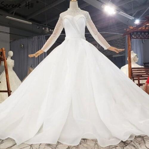 White Long Sleeves High-end Sexy Wedding Dresses 2021 High Collar Perals Diamond Bridal Gowns HX0282 Custom Made