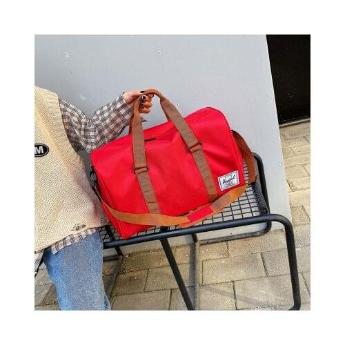 2020 new Men and women tide brand sports fitness bag portable cylinder bag leisure travel Korean large capacity luggage bag