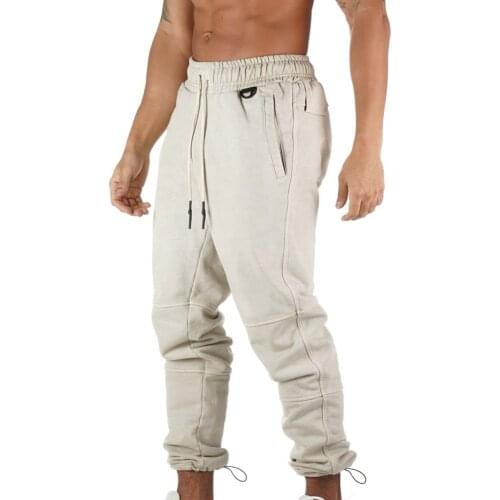 2021 New Product Men’s plus Size Casual Sport Pants Fashion Solid Color Drawstring Bandage Beam Feet Trousers with Pocket