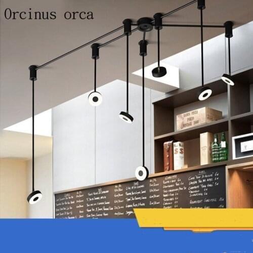 Postmodern creative personality multi head LED chandelier clothing shop restaurant Nordic minimalist art iron pendant lamp