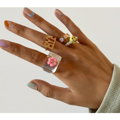 U-Magical Holiday Style Yellow Smile Face Imitation Pearl Beaded Charm Rings for Women Letter Clear Arcylic Rings Jewellery