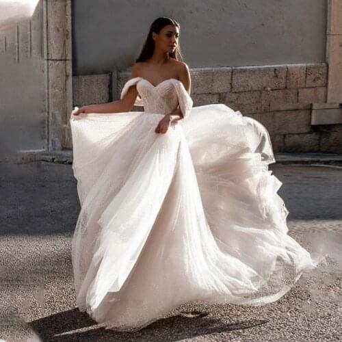 Long Sleeve A Line Wedding Dresses 2021 Appliques O Neck Tulle Bridal Gown Wedding Gowns Floor Length Backless Vestido de Noiva