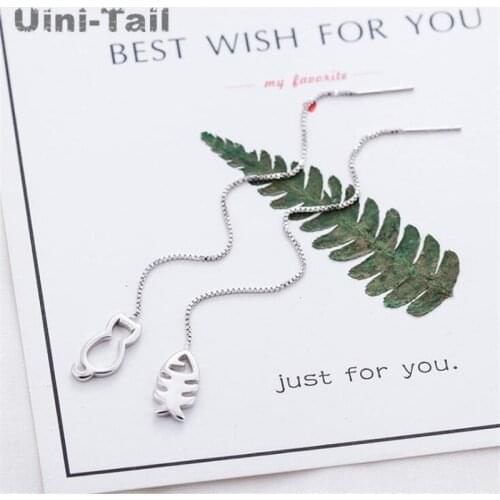 Uini-Tail new hot 925 sterling silver tassel long cat fish earrings simple hollow silver earrings asymmetric earrings GN390