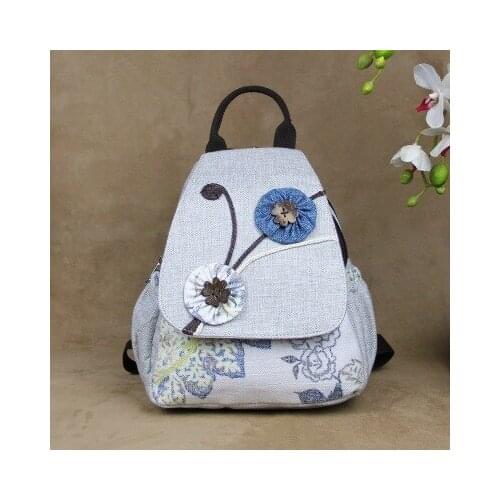 Fashion national string appliques women shopping backpacks!Nice floral prints lady Small backrack All-match canvas Hasp backruck