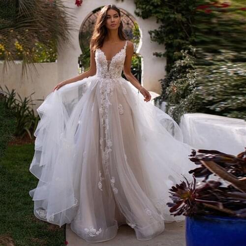 2021 Sexy V-Neck Spaghetti Straps A-Line Wedding Dresses Open Back Lace Appliques Bridal Gowns With Train Princess Formal Dress