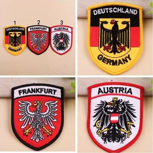 Austria eagle embroidered badge pattern is used to decorate the epaulette patch on the sleeve. Stylish letter applique
