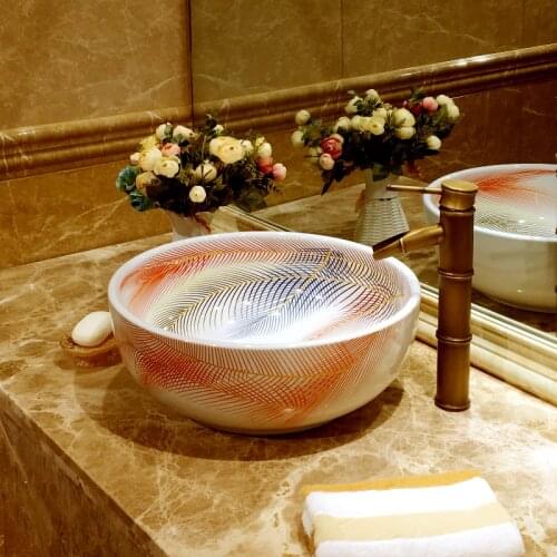Wholesale Feather hand painted round shape art ceramic countertop basin