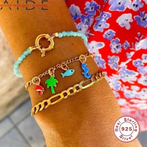 Aide Charm Pendants
