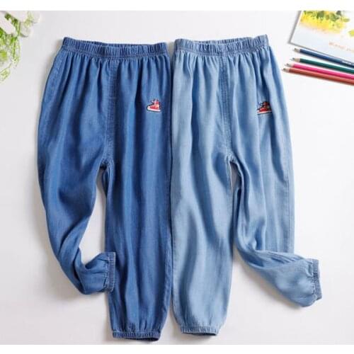 Childrens jeans with elastic waistbands and slim knickerbockers