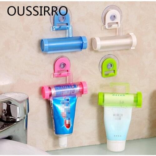 HOT Bathroom Home Tube Rolling Holder Creative Multipurpose Toothpaste Dispenser Bathroom Accessories Manual Syringe Gun Dispens