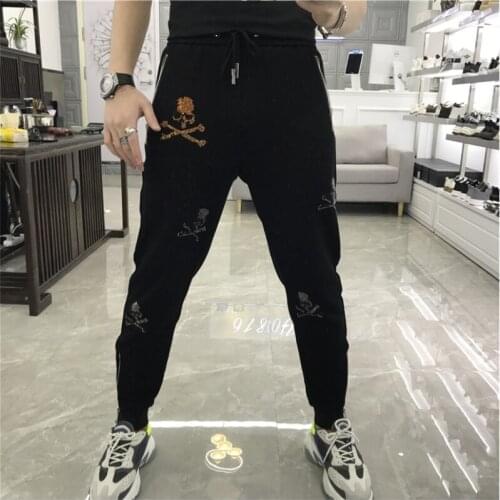 New luxury brand slim pants quality men handsome skull hot drilling pants casual sports pants quick-drying outdoor jumping joggi