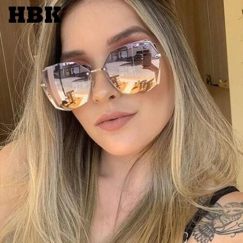 HBK New Fashion Rimless Female Sunglasses Metal Brand Design Irregualr Frameless Traveling Style UV400 Gold Tea For Men Outside