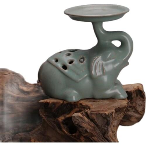 Early collection of Northern Song Dynasty Ru kiln iron embryo green glaze small elephant oil lamp household porcelain collection