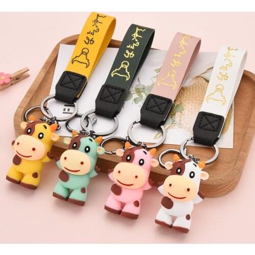 Creative Resin Cow Keychain 2021 New Zodiac Mascot Charm PU Bronzing Leather Buckle Keyring for Women Couple Bag Keychains