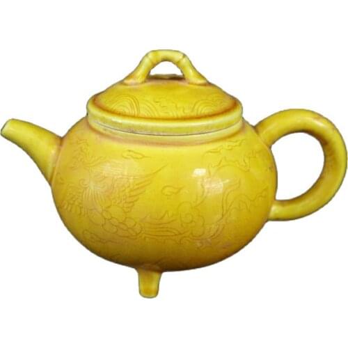 Collection of yellow glazed double phoenix pattern teapots of Chinese porcelain