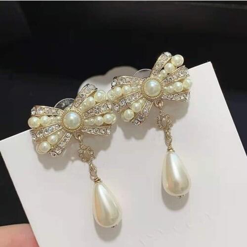 Hot Brand Yellow Gold Color Fashion Jewelery Woman Pearls Earrings Bowknot Party High Quality Chain Drop Pearls Studing Jewelry