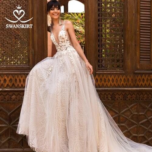 SwanSarah Stunning Beaded Wedding Dress 2020 V-neck Appliques A-Line Backless Illusion Princess Bride Gown Vestido De Novia F263