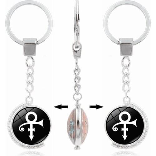 Cheap Fashion Jewelry with Silver Plated Unique Pattern Rotate Glass Cabochon Keychain Ring for Unisex Gift