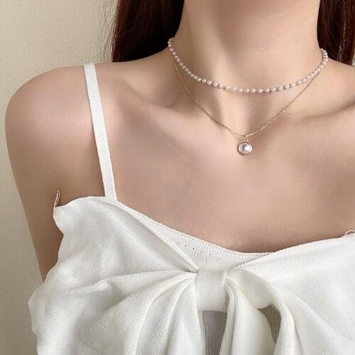 New European and American personality design double-layer necklace retro pearl clavicle chain net red fashion fishtail pendant n
