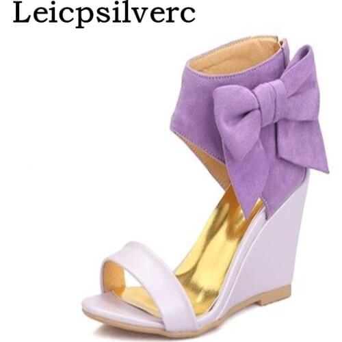 Summer new slope with the fish mouth after the zipper sweet butterfly knot student women sandals