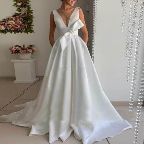 Luxury New White Wedding Dress Bow Sleeveless V Neck A Line Full Length Backlesses Robe De Soire De Mariage Elegant Bridal Gowns