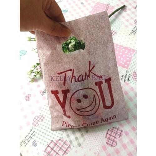 Wholesale 100pcs/lot 15*20cm Smile Face Coffee Plastic Bags Boutique Candy Gifts Jewelry Packaging Bags Gift Bag With Handle