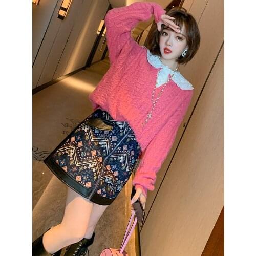 2020 autumn and winter new heavy industry retro jacquard fashion zipper stitching PU leather A-line skirt DQ1205