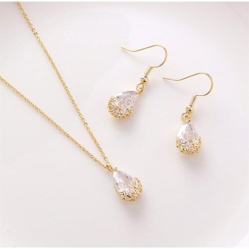 Japan and South Korea Fashion and Popular Retro Water Drop Zircon Pendant Necklace Same Earrings Personality Shiny Hollow Flower