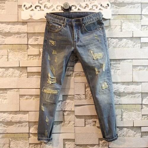 Mens fashion washed ripped tailor denim jeans Japan and South Korea trend of beggar pants Slim feet nakle length pants