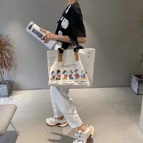 Japan South Korea Disney Mickey Mouse Minnie laptop shoulder bag wild female large capacity single shoulder messenger bag