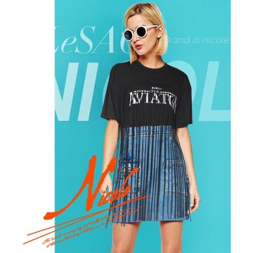 Loose short-sleeved 2021 new womens clothes summer and autumn design sense ins trend Su black white t-shirt tassel top