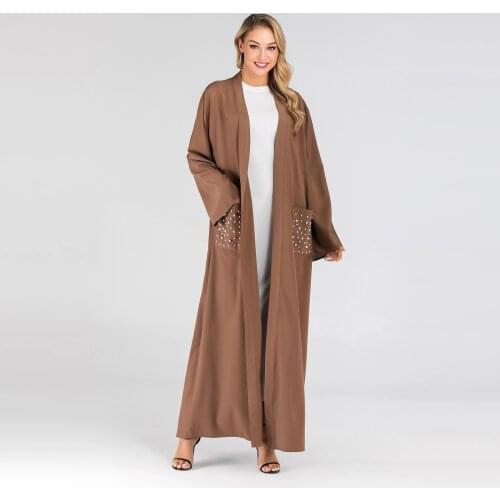 Dubai Muslim abaya modern dignified and fashionable Islamic clothing robe with pearl pockets on the chest dress