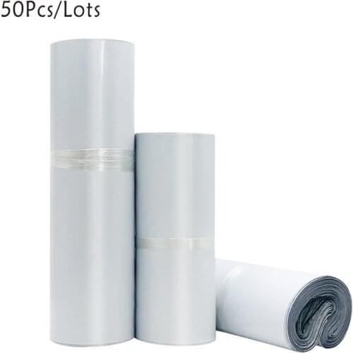 50pcs/Lots White Courier Bags Envelope Storage Bags Mail Bag Self Adhesive Seal Plastic Packaging Pouch Waterproof Transport Bag
