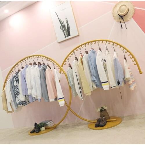 Childrens clothing shop decoration creative shelf display rack landing type Zhongdao shelf display hanger gold