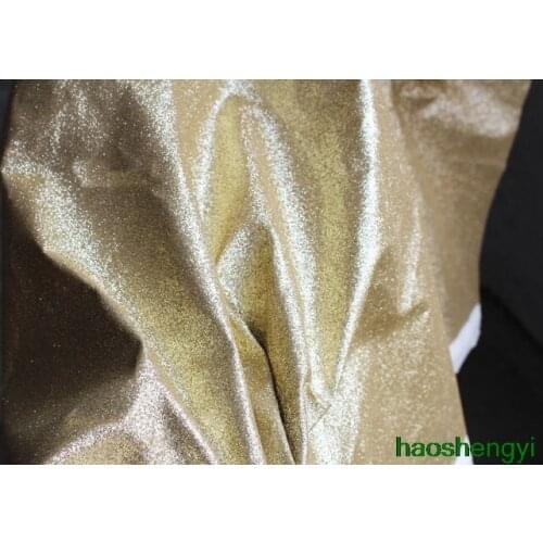 High-end stiff gold powder era bronzing knitted imitation pu leather wedding background clothing modeling fabric