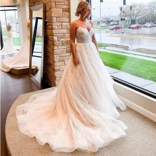 Luxury A-line Wedding Dress Appliques Spaghetti Straps Chapel Train Robe De Mariee 2019 New Bridal Dress Backless Wedding Gowns