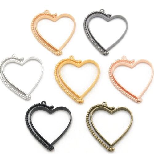 7pcs 7 Color 30*40mm Charm rotating heart hollow rubber blank pendant frame DIY mold manual frame production