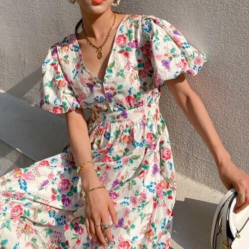 Summer new floral dress V-neck French bubble sleeve waist trimming medium and long skirt womens wear