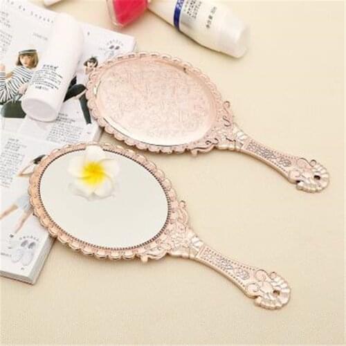 Vintage Hand Held Oval Ladies Floral Repousse Mirror Makeup Beauty
