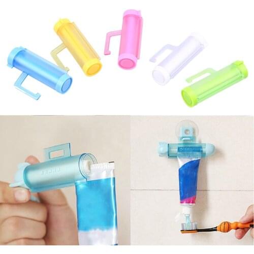 1PC Toothpaste Dispenser Plastic Rolling Squeezer Tube Sucker Holder Storage Rack Organizer Bathroom Accessories Random Color