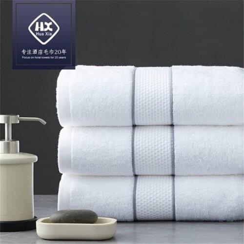 Hotel cotton towel set household white large bath towel face towel does not lint strong water absorption 140*80cm about 560g
