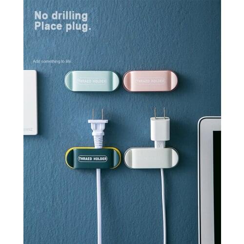 Non-marking plug holder wall-mounted plastic cable organizer household creative wire storage artifact socket hook