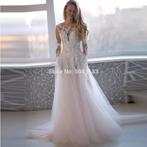 2021 Beading Applique Long Sleeves Wedding Dresses Sheer Sexy O Neck Pink Vestido De Noiva Floor Length Buttons Back Bride Dress