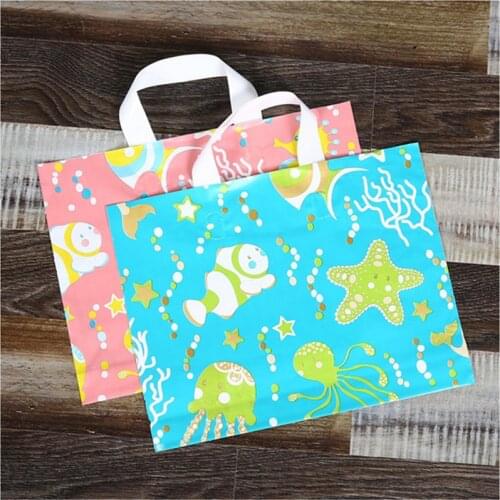 Plastic gift bags with handles plastic packaging bag lot 50 pcs carrier bag for shopping good quality plastic bags wholesale