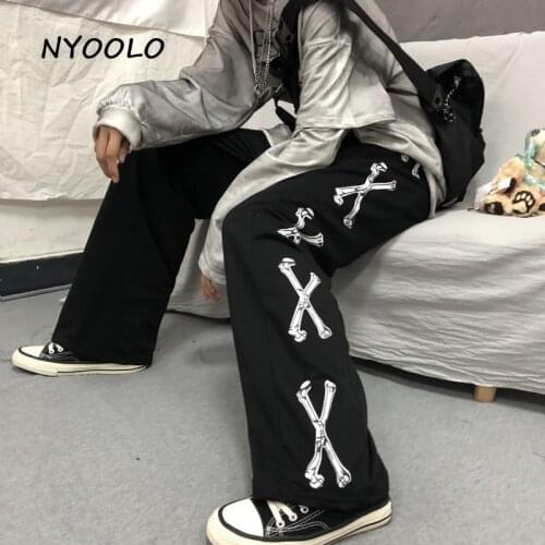 NYOOLO Vintage streetwear personality bone print pants Casual loose elastic waist full length straight pants women men